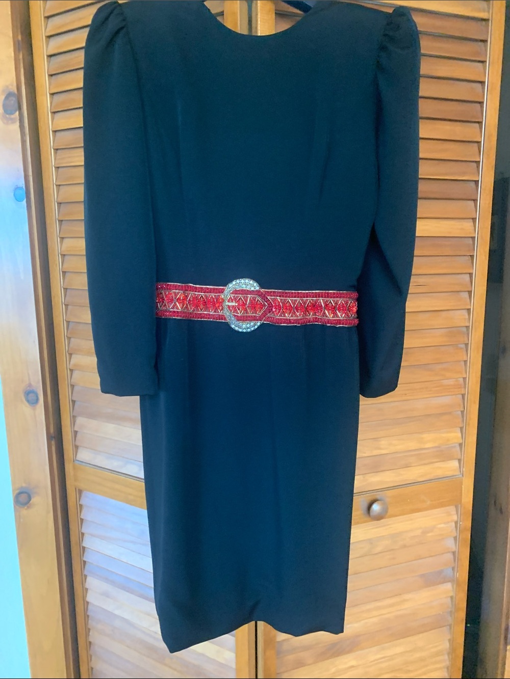 Caroline Herrera black dress with wide beaded attached belt area